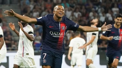 PSG's Kylian Mbappe celebrates after scoring the opening goal during the French League One soccer match between Lyon and Paris Saint-Germain at the Groupama stadium, outside Lyon (AP) PSG's Kylian Mbappe celebrates after scoring the opening goal during the French League One soccer match between Lyon and Paris Saint-Germain at the Groupama stadium, outside Lyon (AP)