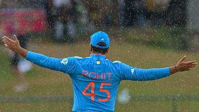 Rohit Sharma gestures after rain stopped play during the Asia Cup 2023 match between India and Nepal at the Pallekele International Cricket Stadium in Kandy (AFP) Rohit Sharma gestures after rain stopped play during the Asia Cup 2023 match between India and Nepal at the Pallekele International Cricket Stadium in Kandy (AFP)