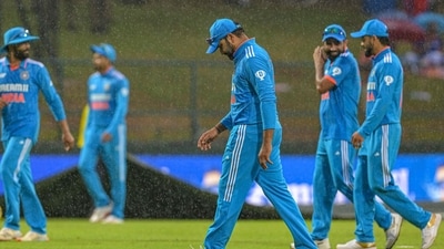 India's captain Rohit Sharma (C) along with his teammates leaves the field after rain stopped play during the Asia Cup 2023 (AFP)
