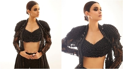 Diana styled the statement blouse with a see-through cape jacket featuring similar beaded embellishments on the shoulders, Chikankari embroidery, tassels, feather adornments, full-length sleeves, and an open front. Sharara pants with a high-rise waist, flared silhouette, intricate Chikan embroidery, and shimmering diamantes completed the ensemble. (Instagram) Diana styled the statement blouse with a see-through cape jacket featuring similar beaded embellishments on the shoulders, Chikankari embroidery, tassels, feather adornments, full-length sleeves, and an open front. Sharara pants with a high-rise waist, flared silhouette, intricate Chikan embroidery, and shimmering diamantes completed the ensemble. (Instagram)