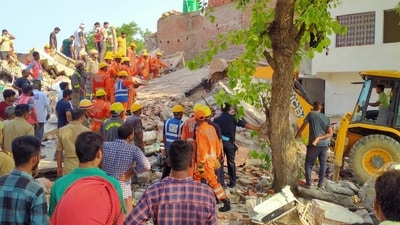 Two people were killed and 10 others injured after a three-storey building in Fatehpur, Uttar Pradesh collapsed on Monday, police said. (PTI) Two people were killed and 10 others injured after a three-storey building in Fatehpur, Uttar Pradesh collapsed on Monday, police said. (PTI)