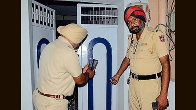 Police investigating at the spot after a gunshot was reported in a clash between two groups at Gill road near ATI in Ludhiana. (ht photo)