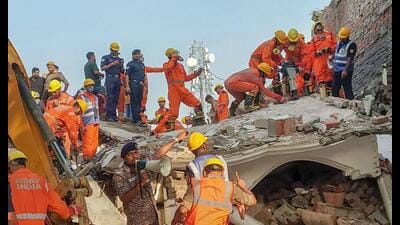 Rescue operation underway after a building in the Fatehpur area collapsed, in Barabanki district, Monday. (PTI Photo) Rescue operation underway after a building in the Fatehpur area collapsed, in Barabanki district, Monday. (PTI Photo)