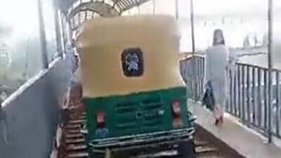 The Delhi Police acted against the auto-rickshaw driver after the video clip went viral (Screengrab) The Delhi Police acted against the auto-rickshaw driver after the video clip went viral (Screengrab)