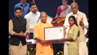 U. P. chief minister Yogi Adityanath giving away an appointment letter to a selected candidates in Lucknow on September 4. (Deepak Gupta/HT) U. P. chief minister Yogi Adityanath giving away an appointment letter to a selected candidates in Lucknow on September 4. (Deepak Gupta/HT)