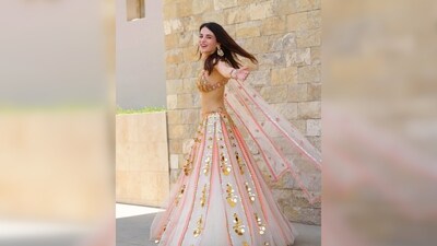 Radhika Madan's set comes with a backless tulle bralette embellished with glass cut beads and chain straps and a tulle baby pink dupatta. (Instagram/@radhikamadan) Radhika Madan's set comes with a backless tulle bralette embellished with glass cut beads and chain straps and a tulle baby pink dupatta. (Instagram/@radhikamadan)