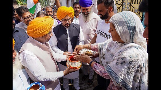 Union minister Anurag Thakur during the collection of country's soil as part of BJP's 'Kalash Yatra' remembering the unsung heroes and martyrs of the freedom struggle, in Phagwara on Monday. (PTI)