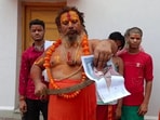 On Monday, Paramhans Acharya announced a reward of <span class='webrupee'>₹</span>10 crore for beheading the DMK leader over his remarks against 'Sanatan Dharma. On Monday, Paramhans Acharya announced a reward of <span class='webrupee'>₹</span>10 crore for beheading the DMK leader over his remarks against 'Sanatan Dharma.