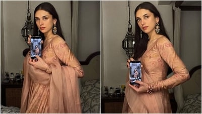 The second set of pictures shows Aditi dressed in a silk anarkali suit set. She chose a mauve pink-coloured number adorned with intricate floral patterns in different shades. The anarkali kurta features a wide round neckline, full-length sleeves, a fit and flare silhouette, and a pleated skirt. (Instagram) The second set of pictures shows Aditi dressed in a silk anarkali suit set. She chose a mauve pink-coloured number adorned with intricate floral patterns in different shades. The anarkali kurta features a wide round neckline, full-length sleeves, a fit and flare silhouette, and a pleated skirt. (Instagram)