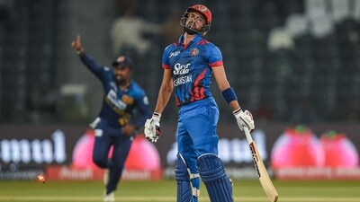 Ibrahim Zadran gestures after his dismissal during the Asia Cup 2023 match between Sri Lanka and Afghanistan (AFP)