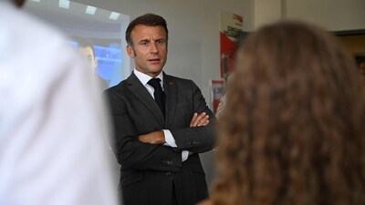 French President Emmanuel Macron meets with pupils during a visit the Daniel Argote secondary school in Orthez, southwest France, September 5, 2023, as part of a trip for the start of the new school year. (Photo by Caroline BLUMBERG / POOL / AFP) (AFP) French President Emmanuel Macron meets with pupils during a visit the Daniel Argote secondary school in Orthez, southwest France, September 5, 2023, as part of a trip for the start of the new school year. (Photo by Caroline BLUMBERG / POOL / AFP) (AFP)