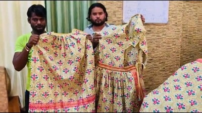 Mathura jail inmates showing the clothes for Banke Bihari . (Sourced) Mathura jail inmates showing the clothes for Banke Bihari . (Sourced)