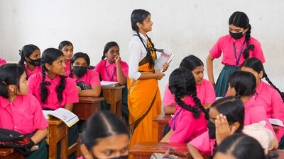 A senior student teaches in a class of juniors as part of celebrations of the Teachers' Day, in Agartala. (PTI) A senior student teaches in a class of juniors as part of celebrations of the Teachers' Day, in Agartala. (PTI)