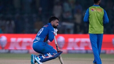 Rashid Khan reacts after losing the Asia Cup match against Sri Lanka in Lahore, (AP)