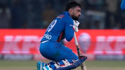 Rashid Khan reacts after losing match against Sri Lanka in Lahore (AP) Rashid Khan reacts after losing match against Sri Lanka in Lahore (AP)
