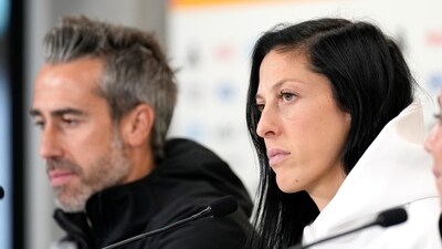 Spain's Jennifer Hermoso, right, and head coach Jorge Vilda listens to reporters' questions during a press conference at Eden Park (AP)