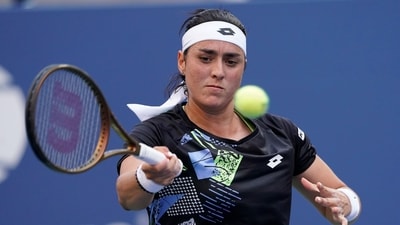 Ons Jabeur, of Tunisia, returns a shot to Qinwen Zheng, of China, during the fourth round of the U.S. Open (AP) Ons Jabeur, of Tunisia, returns a shot to Qinwen Zheng, of China, during the fourth round of the U.S. Open (AP)