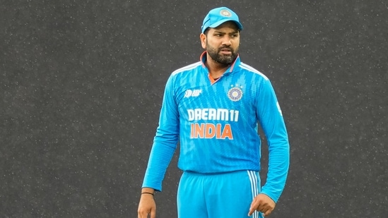 India's captain Rohit Sharma stands in the field as it drizzles during the Asia Cup cricket match against Nepal in Pallekele (AP)
