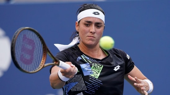 Ons Jabeur, of Tunisia, returns a shot to Qinwen Zheng, of China, during the fourth round of the U.S. Open (AP)