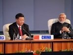 Prime Minister Narendra Modi and China's President Xi Jinping attend a BRICS summit meeting in Johannesburg, South Africa.