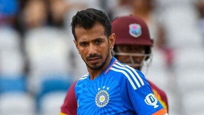 Yuzvendra Chahal (L) of India celebrates the dismissal of Kyle Mayers (R) of West Indies (AFP) Yuzvendra Chahal (L) of India celebrates the dismissal of Kyle Mayers (R) of West Indies (AFP)