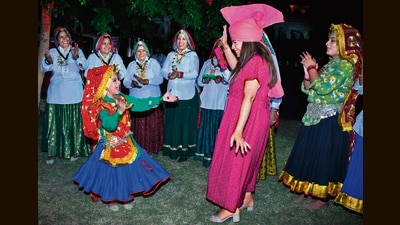 Foreign delegates join the festivities at ITC Grand Bharat hotel in Nuh on Wednesday. (HT Photo)