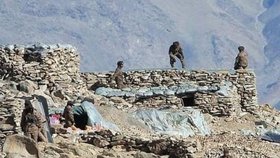 In this undated handout photograph released by the Indian Army on February 16, 2021 shows People Liberation Army (PLA) soldiers during military disengagement along the Line of Actual Control (LAC) at the India-China border in Ladakh. (Photo by - / INDIAN MINISTRY OF DEFENCE / AFP) In this undated handout photograph released by the Indian Army on February 16, 2021 shows People Liberation Army (PLA) soldiers during military disengagement along the Line of Actual Control (LAC) at the India-China border in Ladakh. (Photo by - / INDIAN MINISTRY OF DEFENCE / AFP)