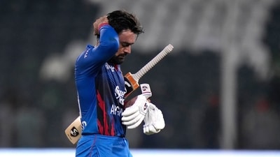 Afghanistan's Rashid Khan reacts after losing match on the end of the Asia Cup cricket match between Afghanistan and Sri Lanka in Lahore, Pakistan. (AP) Afghanistan's Rashid Khan reacts after losing match on the end of the Asia Cup cricket match between Afghanistan and Sri Lanka in Lahore, Pakistan. (AP)