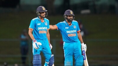 India's Rohit Sharma, right, congratulates Shubman Gill for scoring a half century during the Asia Cup cricket match between India and Nepal in Pallekele (AP) India's Rohit Sharma, right, congratulates Shubman Gill for scoring a half century during the Asia Cup cricket match between India and Nepal in Pallekele (AP)