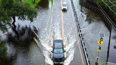 Hurricane Idalia: In this aerial view, vehicles attempt to travel on a flooded road in Tampa, Florida. (AFP) Hurricane Idalia: In this aerial view, vehicles attempt to travel on a flooded road in Tampa, Florida. (AFP)