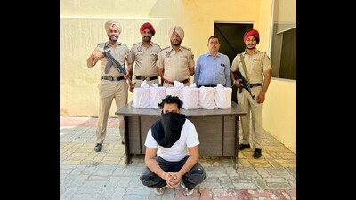 The arrested drug smuggler has been identified as Harpreet Singh of Chohla Sahib, presently residing at New Ranjitpura in Amritsar. (HT photo) The arrested drug smuggler has been identified as Harpreet Singh of Chohla Sahib, presently residing at New Ranjitpura in Amritsar. (HT photo)