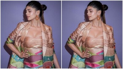 Styled by fashion stylist Priyanka Castelino, Sanjana wore her tresses into a sleek half bun as she posed for the pictures.&nbsp; (Instagram/@sanjanasanghi96)
