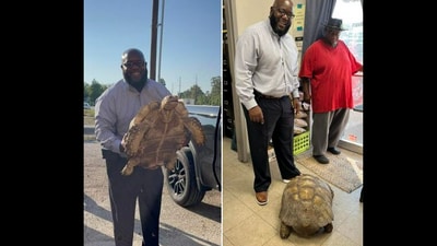 100-year-old tortoise with its family. (Facebook/@The Parish of Ascension )