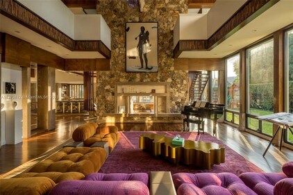 The living room offers great views, and comes with a piano. (Pic: Compass.com) The living room offers great views, and comes with a piano. (Pic: Compass.com)