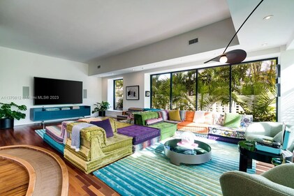 The family room stands out at the mansion with its patchwork seating. (Pic: Compass.com) The family room stands out at the mansion with its patchwork seating. (Pic: Compass.com)