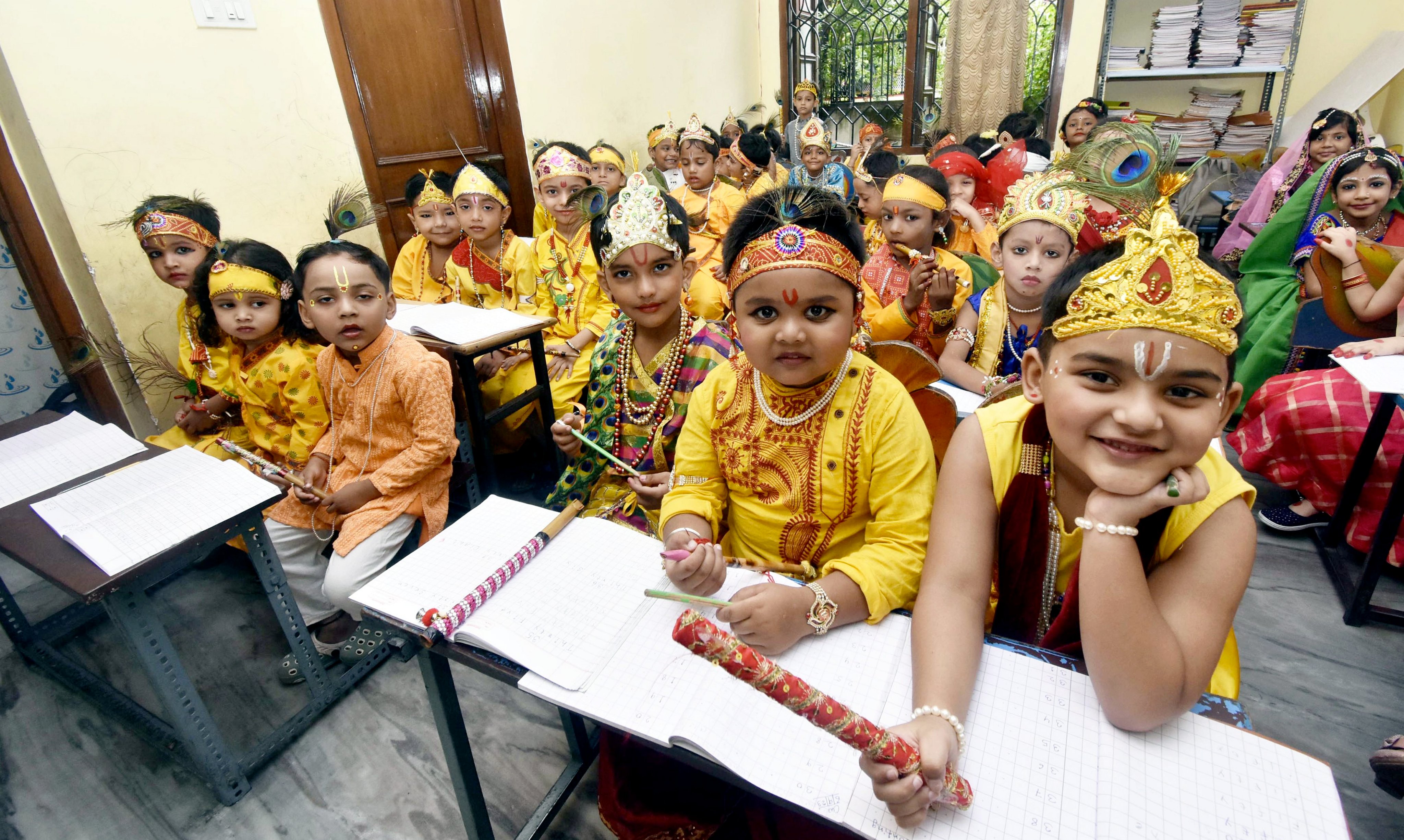 Students from a school in Patna dress up as Lord Krishna to celebrate Krishna Janmashtami. Students from a school in Patna dress up as Lord Krishna to celebrate Krishna Janmashtami.