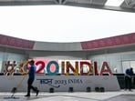 A worker cleans in front of a G20 logo inside the international media centre at the G20 venue days ahead of its commencement in New Delhi on September 7.