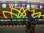 Security personnel stand guard outside the Bharat Mandapam near Pragati Maidan for the G-20 Summit.