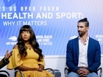 Surgeon General Vivek Murthy, left, speaks along with Naomi Osaka, center, and Michael Phelps, during a forum on mental health during U.S. Open