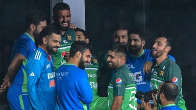 India's Virat Kohli (2L) talks with Pakistan's players at the end of the Asia Cup 2023 one-day international (ODI) cricket match between India and Pakistan at the Pallekele International Cricket Stadium (AFP) India's Virat Kohli (2L) talks with Pakistan's players at the end of the Asia Cup 2023 one-day international (ODI) cricket match between India and Pakistan at the Pallekele International Cricket Stadium (AFP)