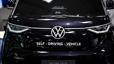 A modified self-driving ID Buzz vehicle by German car maker Volkswagen is displayed at the booth of Mobileye, a system software company developing autonomous driving technologies among others, during the International Motor Show IAA in Munich, southern Germany, on September 6. (AFP) A modified self-driving ID Buzz vehicle by German car maker Volkswagen is displayed at the booth of Mobileye, a system software company developing autonomous driving technologies among others, during the International Motor Show IAA in Munich, southern Germany, on September 6. (AFP)
