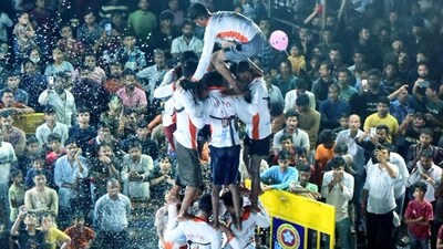 As part of the Janmashtami celebrations, young people popularly called Govindas formed a human chain pyramid to destroy a 'dahi handi' in Nagpur. (PTI) As part of the Janmashtami celebrations, young people popularly called Govindas formed a human chain pyramid to destroy a 'dahi handi' in Nagpur. (PTI)