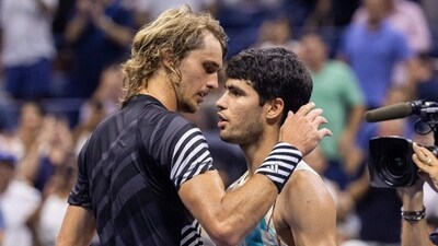 Spain's Carlos Alcaraz (R) and Germany's Alexander Zverev (L) hug after Alcaraz's win the US Open tennis tournament men's singles quarter-finals match. (AFP) Spain's Carlos Alcaraz (R) and Germany's Alexander Zverev (L) hug after Alcaraz's win the US Open tennis tournament men's singles quarter-finals match. (AFP)