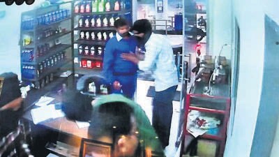 The incident took place at around 7:20 pm when four men, with their faces covered, came to Sai Kirpa Filling Station, on two motorcycles. (Videograb) The incident took place at around 7:20 pm when four men, with their faces covered, came to Sai Kirpa Filling Station, on two motorcycles. (Videograb)
