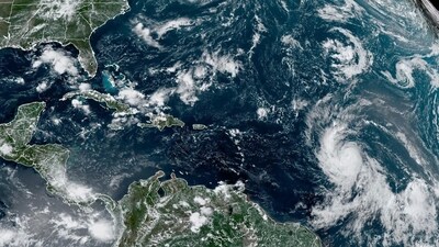 This Wednesday, Sept. 6, 2023, satellite image provided by the National Oceanic and Atmospheric Administration shows Hurricane Lee, right, off in the central tropical Atlantic Ocean. (AP File) This Wednesday, Sept. 6, 2023, satellite image provided by the National Oceanic and Atmospheric Administration shows Hurricane Lee, right, off in the central tropical Atlantic Ocean. (AP File)