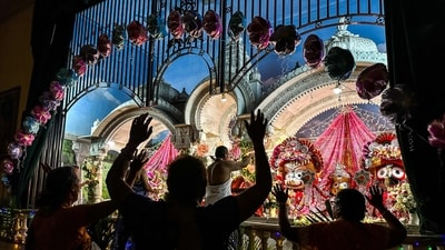 Devotees gather at a temple in Miami, Florida, for celebrations on the night of the Janmashtami festival, which commemorates the birth of Lord Krishna. ( CHANDAN KHANNA/AFP) Devotees gather at a temple in Miami, Florida, for celebrations on the night of the Janmashtami festival, which commemorates the birth of Lord Krishna. ( CHANDAN KHANNA/AFP)
