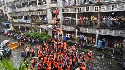 Govinda revellers build a human pyramid to reach and smash the earthen pot during the festival of Dahi Handi on Krishna Janmashtami in Parel, Mumbai. (HT photo/AnshumanPoyrekar.) Govinda revellers build a human pyramid to reach and smash the earthen pot during the festival of Dahi Handi on Krishna Janmashtami in Parel, Mumbai. (HT photo/AnshumanPoyrekar.)