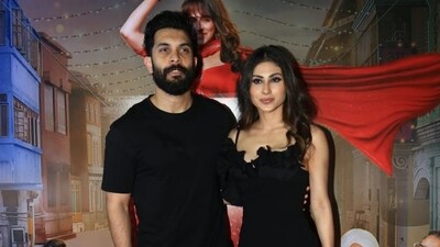 Mouni Roy and husband Suraj Nambiar also posed on the red carpet. The couple twinned in black outfits. While Mouni wore a little black dress, her husband was dressed more casually and paired his look with white sneakers. Mouni Roy and husband Suraj Nambiar also posed on the red carpet. The couple twinned in black outfits. While Mouni wore a little black dress, her husband was dressed more casually and paired his look with white sneakers. 