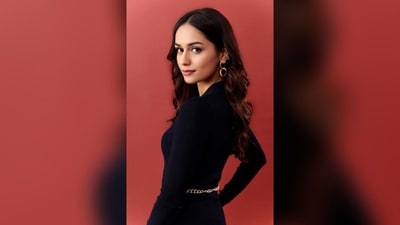 To complete her glamorous look, Manushi kept her hair in lush curls and left it open in the middle, cascading beautifully down her shoulders. (Instagram/@manushi_chhillar) To complete her glamorous look, Manushi kept her hair in lush curls and left it open in the middle, cascading beautifully down her shoulders. (Instagram/@manushi_chhillar)
