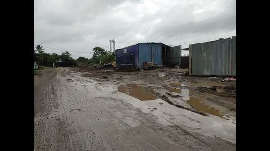 The 100-metre road connecting the SNBP School and Star Gate Society is in shambles. (HT PHOTO)